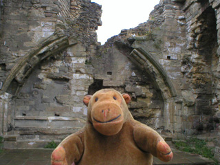 Mr Monkey looking at the arch on the dias