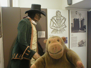 Mr Monkey looking at a mannequin of Blind Jack
