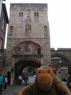 Mr Monkey looking at Monk Bar from Goodramgate