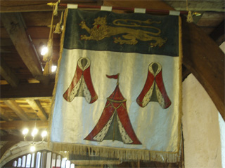 A banner with the arms of the Merchant Taylors