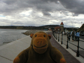 Mr Monkey walking away from Scarborough harbour