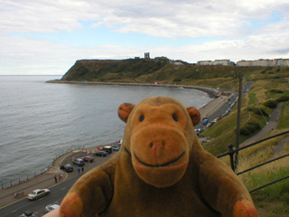 Mr Monkey looking at Scarborough Castle from Queens Parade