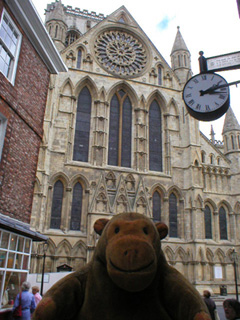 Mr Monkey looking at York Minster from Stonegate
