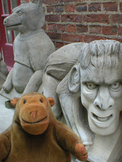 Mr Monkey looking some carved gargoyles