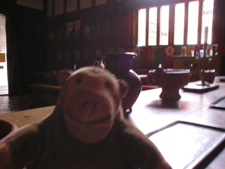 Mr Monkey sitting at the top table in the great hall