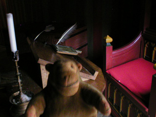 Mr Monkey looking at the writing desk in the parlour