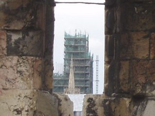 The east front of York Minster viewed through a window in Clifford's Tower