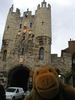 Mr Monkey looking up at the outside of Micklegate Bar