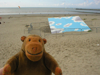 Mr Monkey looking at The Fallen Sky from the promenade