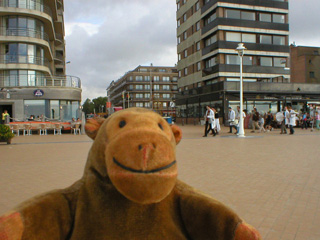 Mr Monkey looking at a student band