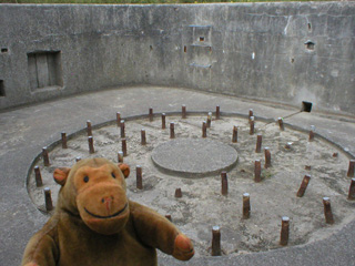 Mr Monkey looking at the place where a 15cm gun should be