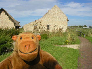 Mr Monkey closer to the medieval cottages
