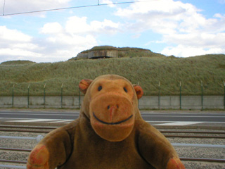 Mr Monkey looking at the main command bunker from the road