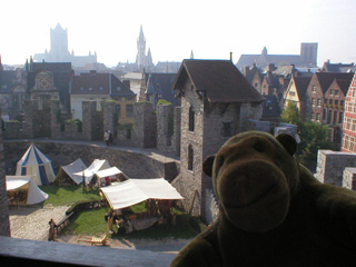Mr Monkey looking at the courtyard from the ramparts beside the Count's House