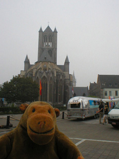 Mr Monkey looking at St Nicholas' church