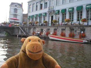 Mr Monkey approaching the Vleeshuisbrug