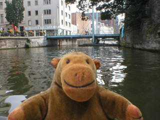 Mr Monkey approaching a swing bridge on the Leie