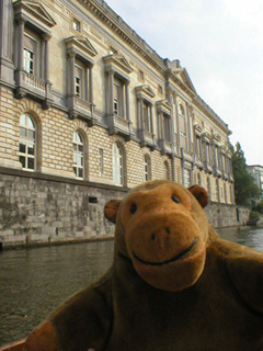 Mr Monkey passing the Palais de Justice