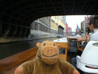 Mr Monkey going under a bridge on the Ketelvaart