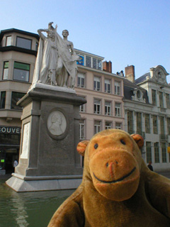 Mr Monkey looking across the square to St Nicholas' church