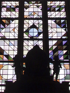 Geometric stained glass in one of St-Baaf's chapels