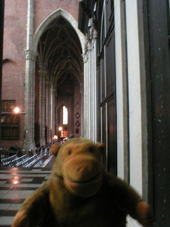 Mr Monkey looking around the south side of St Bavo's cathedral