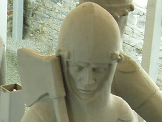The face of one of the carved watchmen