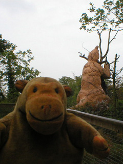 Mr Monkey looking at a megatherium