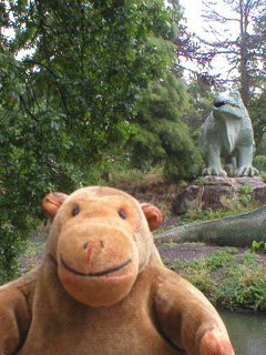 Mr Monkey looking at an Iguanadon