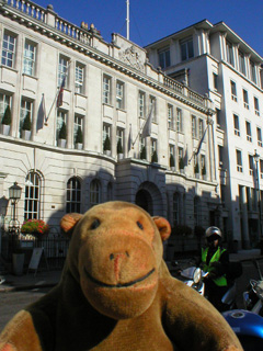 Mr Monkey outside the Courthouse Hotel Kempinski