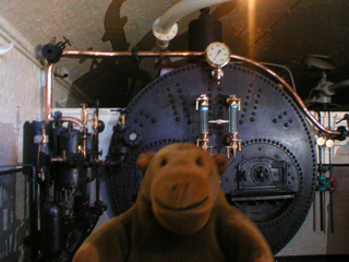 Mr Monkey in front of one of Tower Bridge's Lancashire boilers