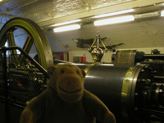 Mr Monkey beside one of Tower Bridges pumping engines