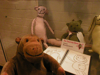 Mr Monkey looking at Claire Montgomerie's Munki, Frogga and Bunni