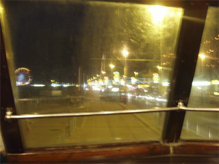 A view from the front window of the top deck of a tram