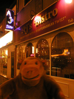 Mr Monkey outside AJs Bistro