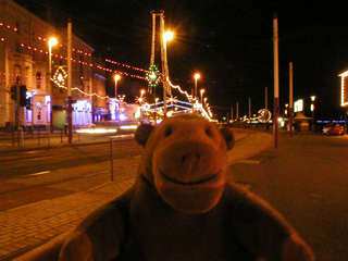 Mr Monkey on the Blackpool promenade at night