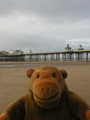 On the beach beside the pier