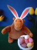 Monkey with bunny ears and eggs