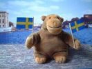 Monkey waving Swedish flags animation