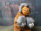 Werewolf monkey in front of gravestones