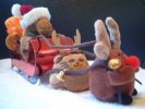 Reindeer and Cat pulling Monkey's sleigh